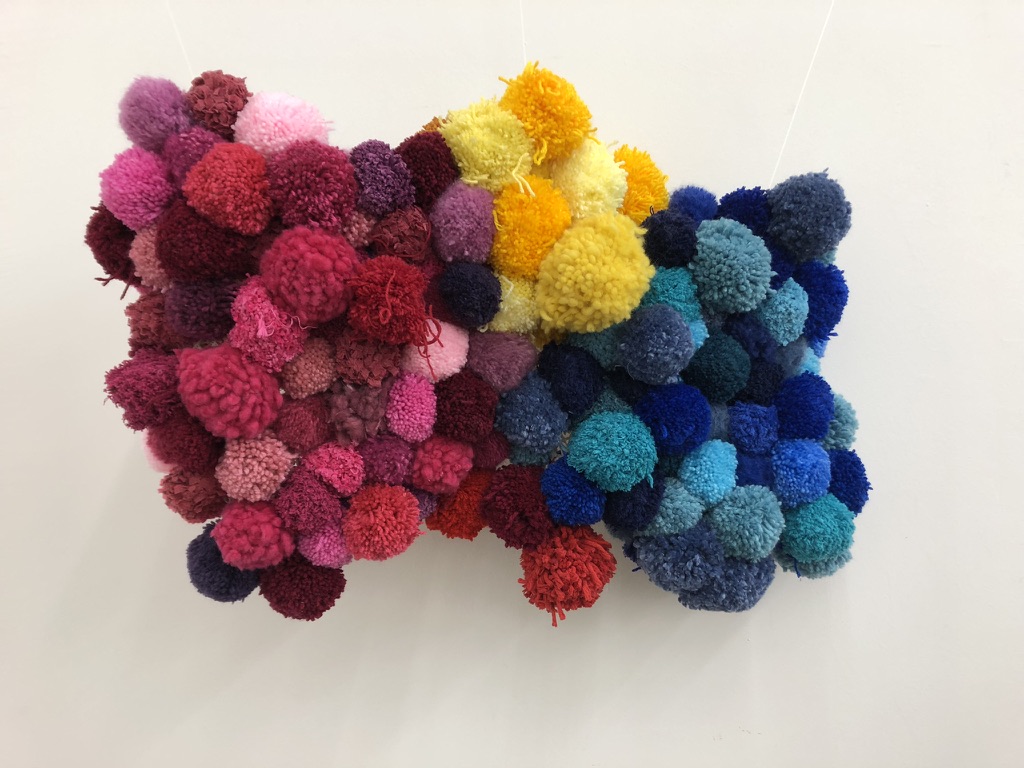 Verschiedenfarbige Pompons aus Wolle Impulse aus den Fortbildungen